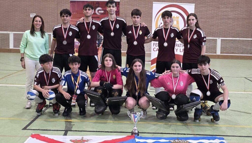 Equipo juvenil de hockey de Ponferrada con medallas y trofeo
