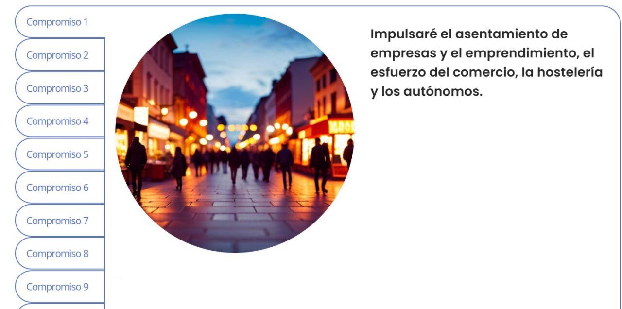 Imagen de una calle iluminada con personas caminando por la noche